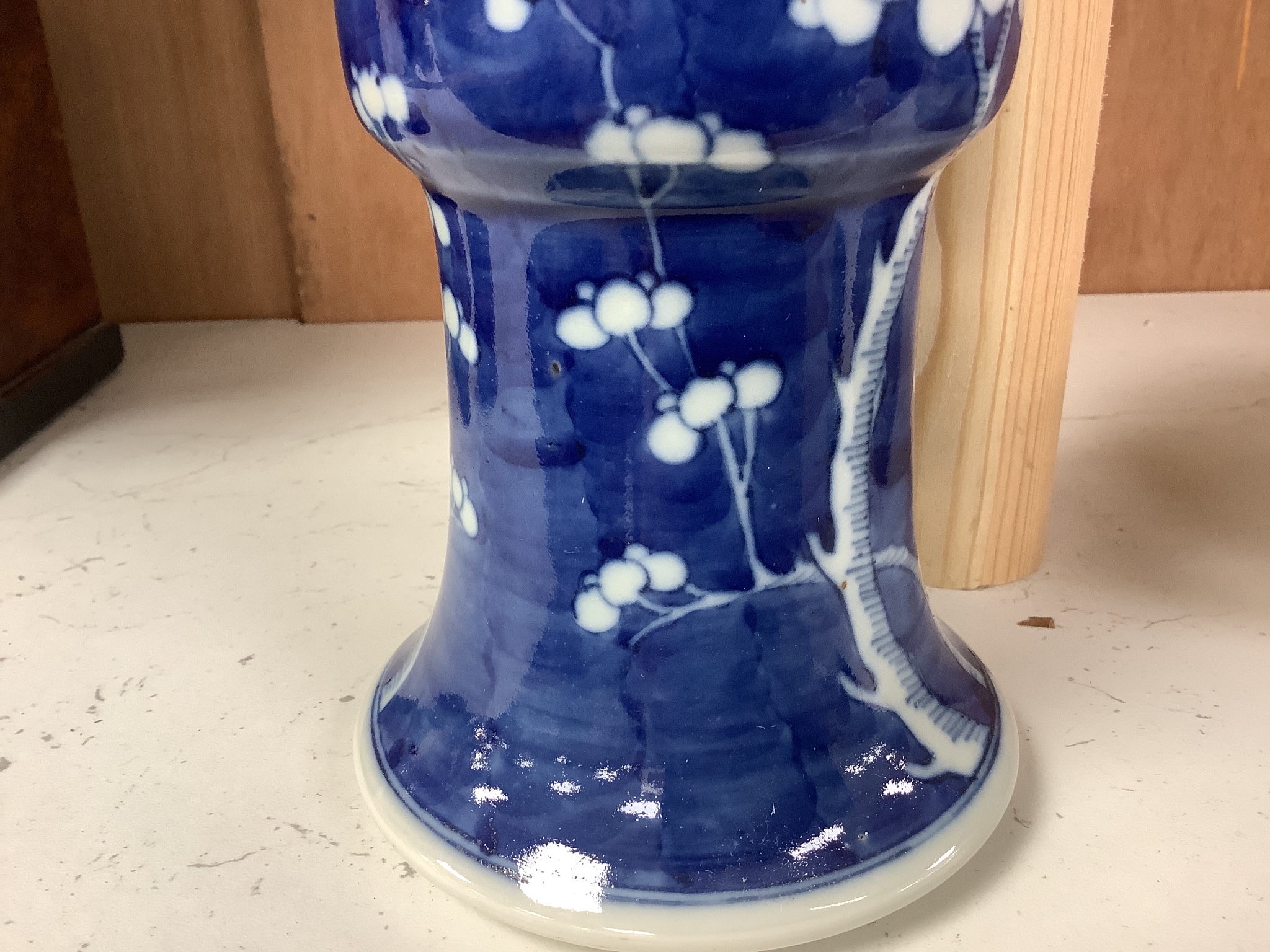 A Chinese blue and white prunus decorated gu vase, 26.5cm